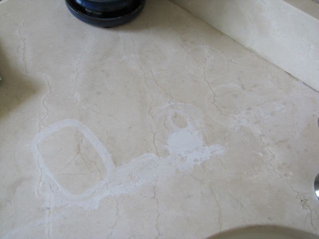 Marble etching - bathroom countertop damage