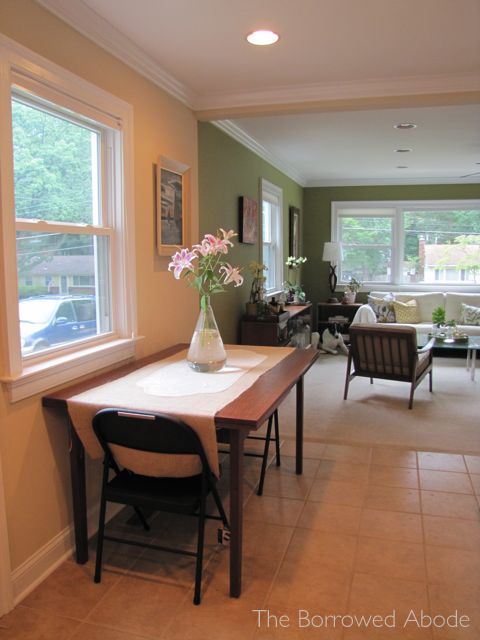 Dining room table against shop wall